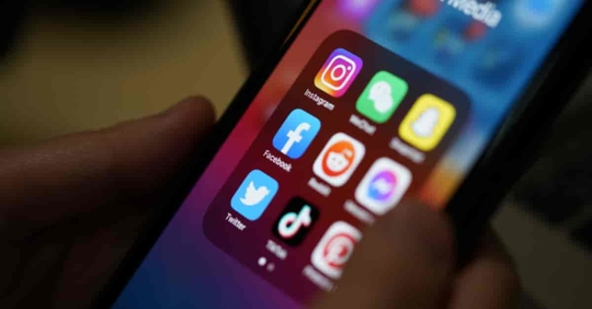 Social media apps on iPhone screen